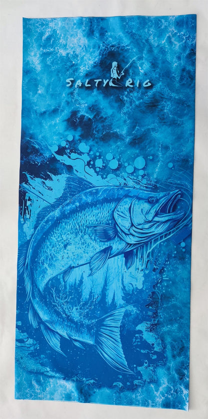 Blue towel with fish design and 'Salty Rig' branding on a white background